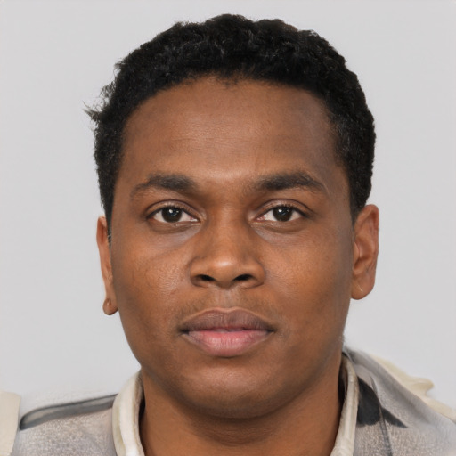 Neutral black young-adult male with short  brown hair and brown eyes