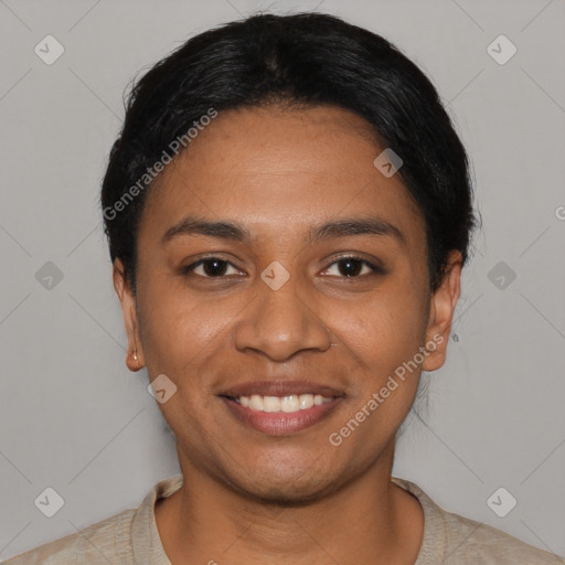 Joyful latino young-adult female with short  black hair and brown eyes