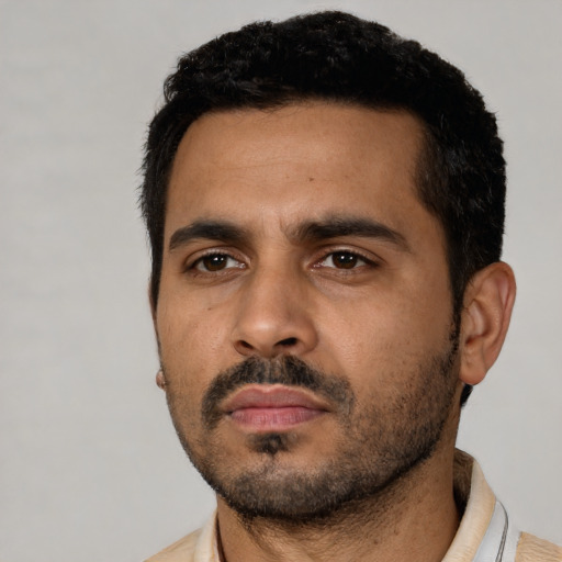 Neutral latino young-adult male with short  black hair and brown eyes