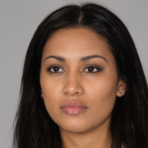 Neutral black young-adult female with long  black hair and brown eyes