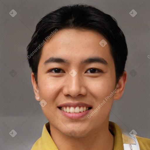 Joyful asian young-adult male with short  brown hair and brown eyes