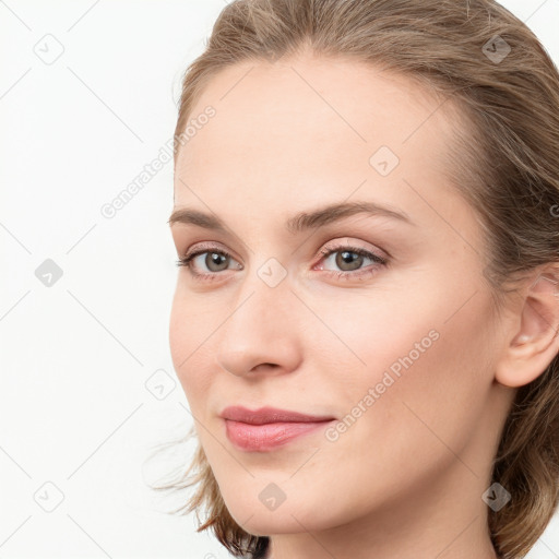 Neutral white young-adult female with long  brown hair and blue eyes