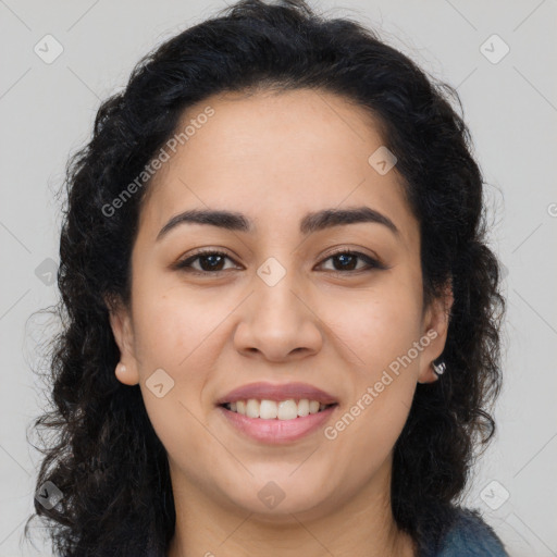 Joyful latino young-adult female with long  brown hair and brown eyes