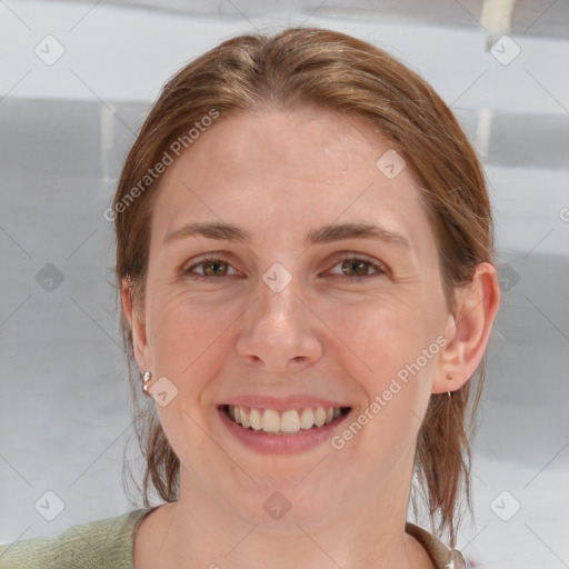 Joyful white young-adult female with medium  brown hair and blue eyes