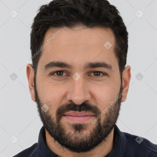 Joyful white young-adult male with short  black hair and brown eyes