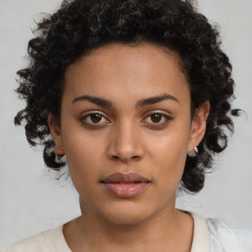 Neutral latino young-adult female with short  black hair and brown eyes