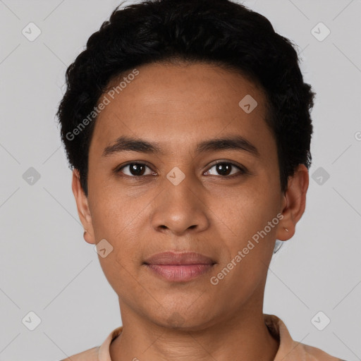 Joyful latino young-adult male with short  black hair and brown eyes