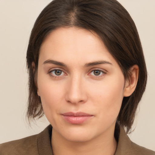 Neutral white young-adult female with medium  brown hair and brown eyes