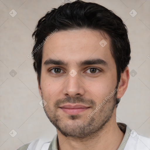 Neutral white young-adult male with short  black hair and brown eyes