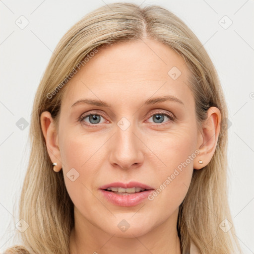 Joyful white young-adult female with long  brown hair and blue eyes