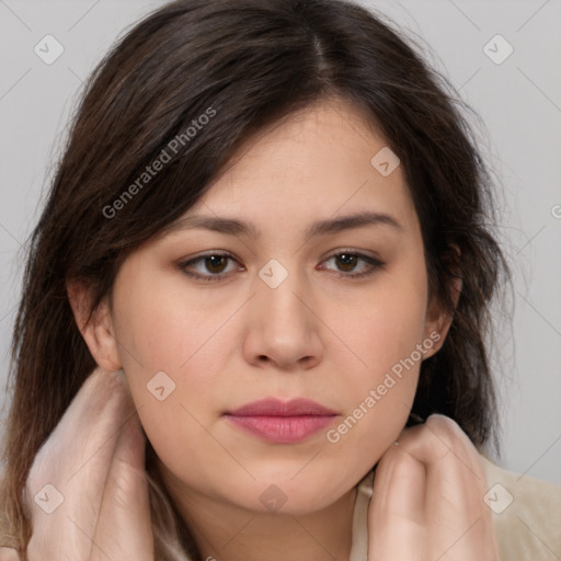 Joyful white young-adult female with medium  brown hair and brown eyes