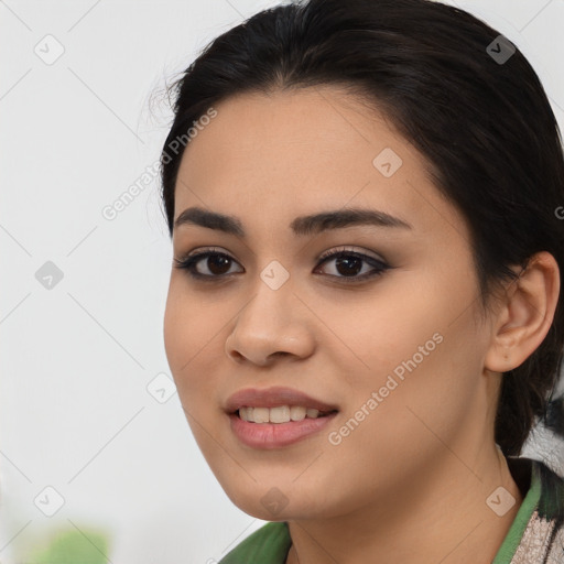 Joyful asian young-adult female with medium  black hair and brown eyes