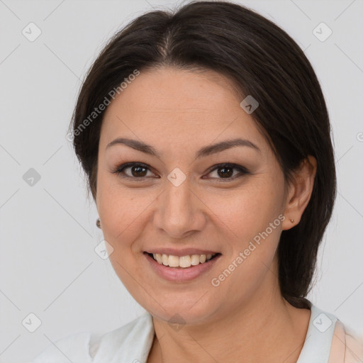 Joyful white young-adult female with medium  brown hair and brown eyes