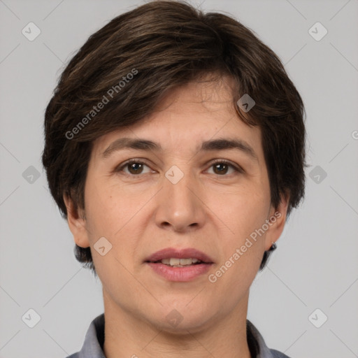 Joyful white adult female with short  brown hair and brown eyes