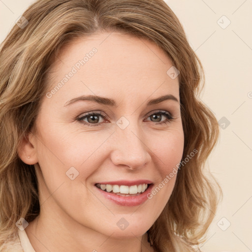 Joyful white young-adult female with medium  brown hair and green eyes