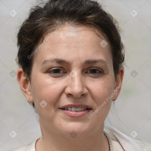 Joyful white adult female with short  brown hair and brown eyes