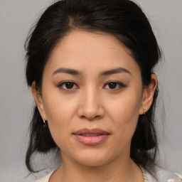 Joyful asian young-adult female with medium  brown hair and brown eyes