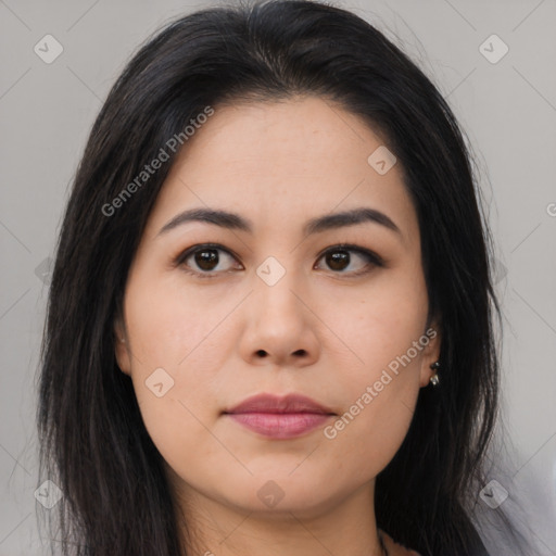 Joyful asian young-adult female with long  brown hair and brown eyes