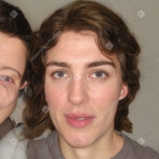 Joyful white adult female with medium  brown hair and green eyes