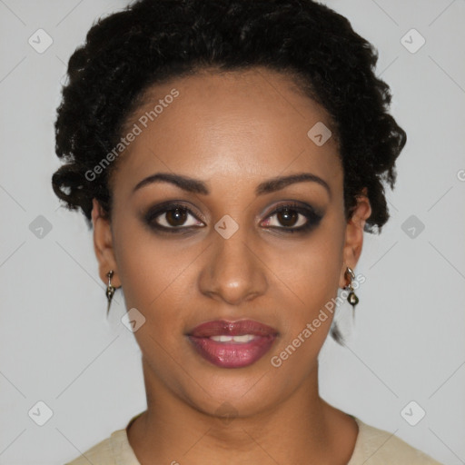 Joyful black young-adult female with short  black hair and brown eyes