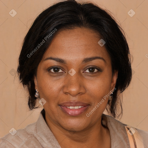 Joyful black adult female with medium  brown hair and brown eyes