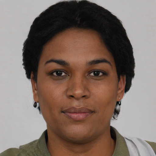 Neutral black young-adult female with short  black hair and brown eyes
