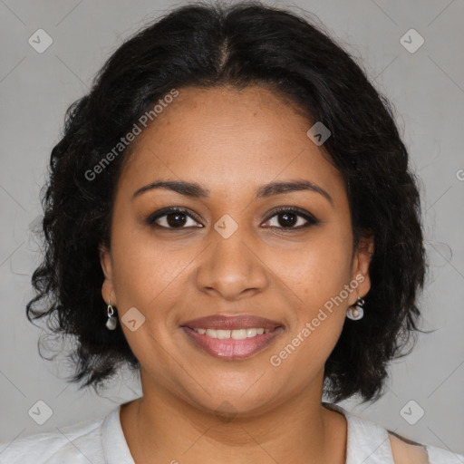 Joyful black young-adult female with medium  brown hair and brown eyes