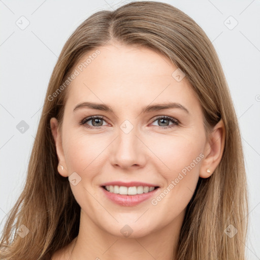 Joyful white young-adult female with long  brown hair and grey eyes