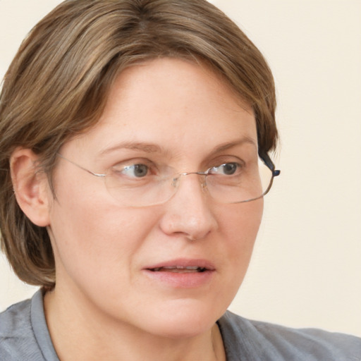 Neutral white adult female with medium  brown hair and blue eyes