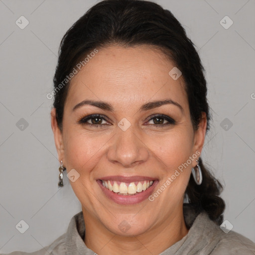 Joyful white adult female with short  brown hair and brown eyes