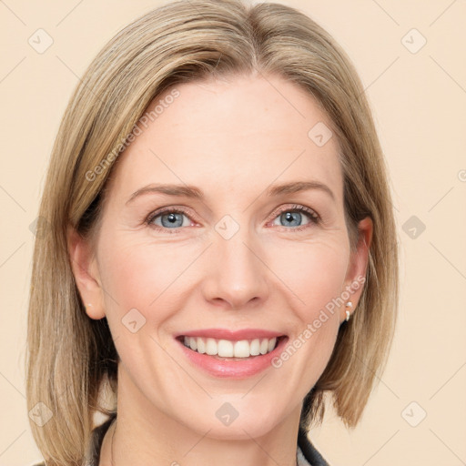 Joyful white young-adult female with medium  brown hair and blue eyes