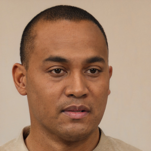 Neutral black young-adult male with short  brown hair and brown eyes