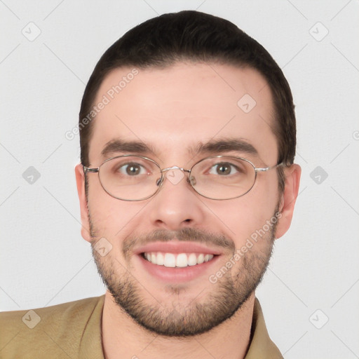 Joyful white young-adult male with short  black hair and brown eyes