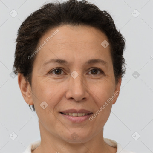 Joyful white adult female with short  brown hair and brown eyes