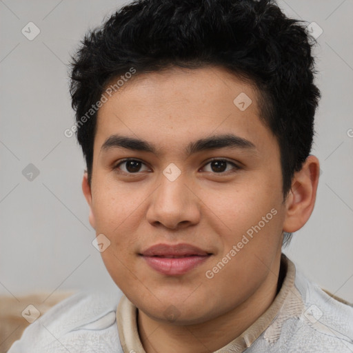 Joyful latino young-adult male with short  brown hair and brown eyes