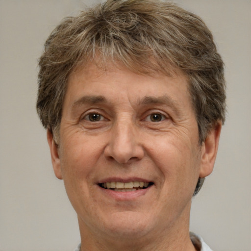 Joyful white middle-aged male with short  brown hair and brown eyes