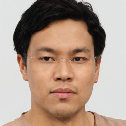 Neutral asian young-adult male with short  brown hair and brown eyes