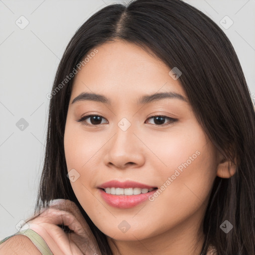 Joyful white young-adult female with long  brown hair and brown eyes