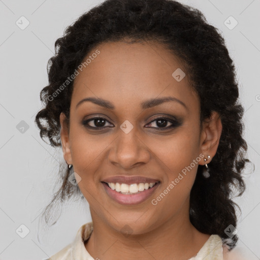 Joyful black young-adult female with medium  brown hair and brown eyes