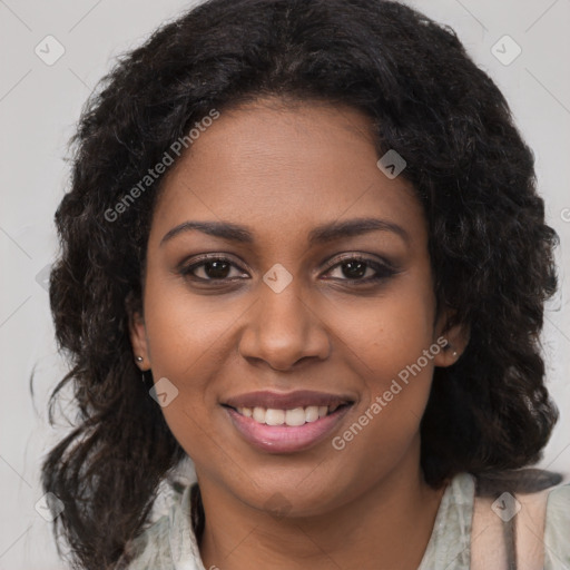 Joyful black young-adult female with medium  brown hair and brown eyes