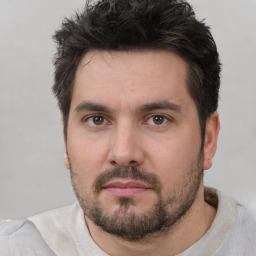 Neutral white young-adult male with short  black hair and brown eyes