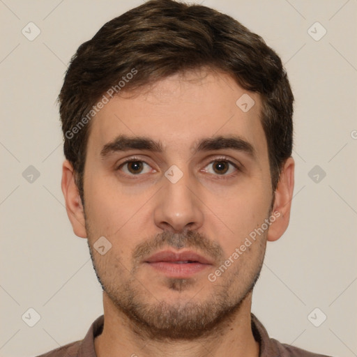 Neutral white young-adult male with short  brown hair and brown eyes