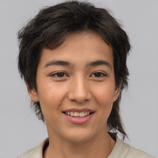 Joyful asian young-adult female with medium  brown hair and brown eyes