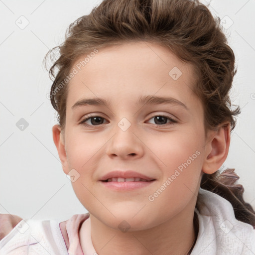 Joyful white child female with short  brown hair and brown eyes