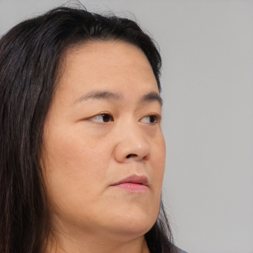 Neutral asian young-adult female with long  brown hair and brown eyes