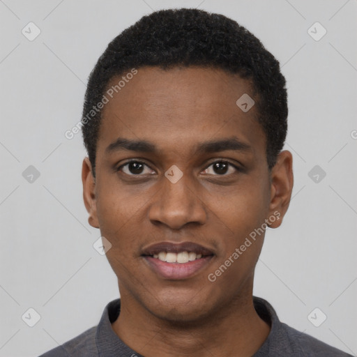 Joyful black young-adult male with short  black hair and brown eyes