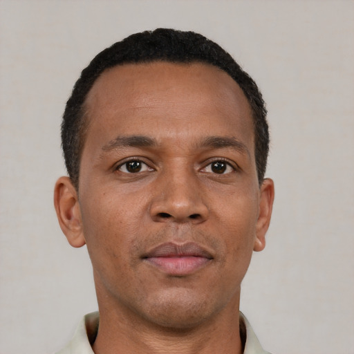 Neutral black young-adult male with short  brown hair and brown eyes