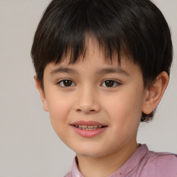 Joyful white child male with short  brown hair and brown eyes