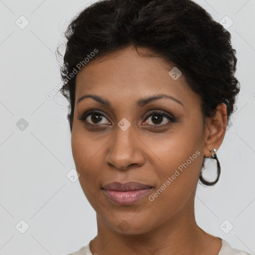 Joyful latino young-adult female with short  brown hair and brown eyes