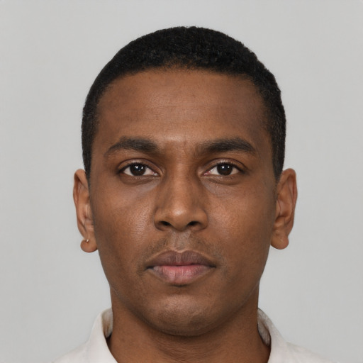 Neutral black young-adult male with short  brown hair and brown eyes
